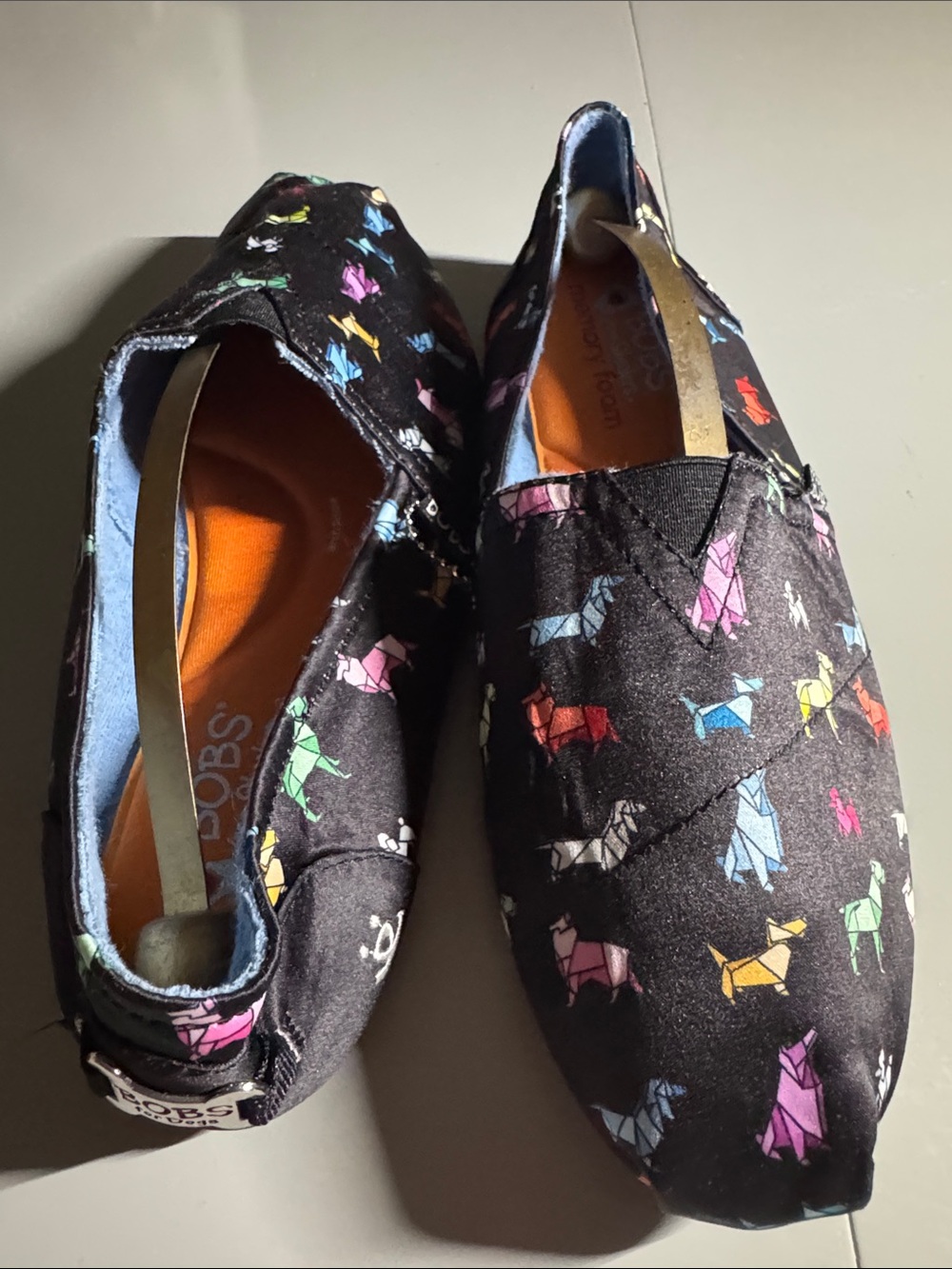 Womenโs Skechers
Origami slip ons